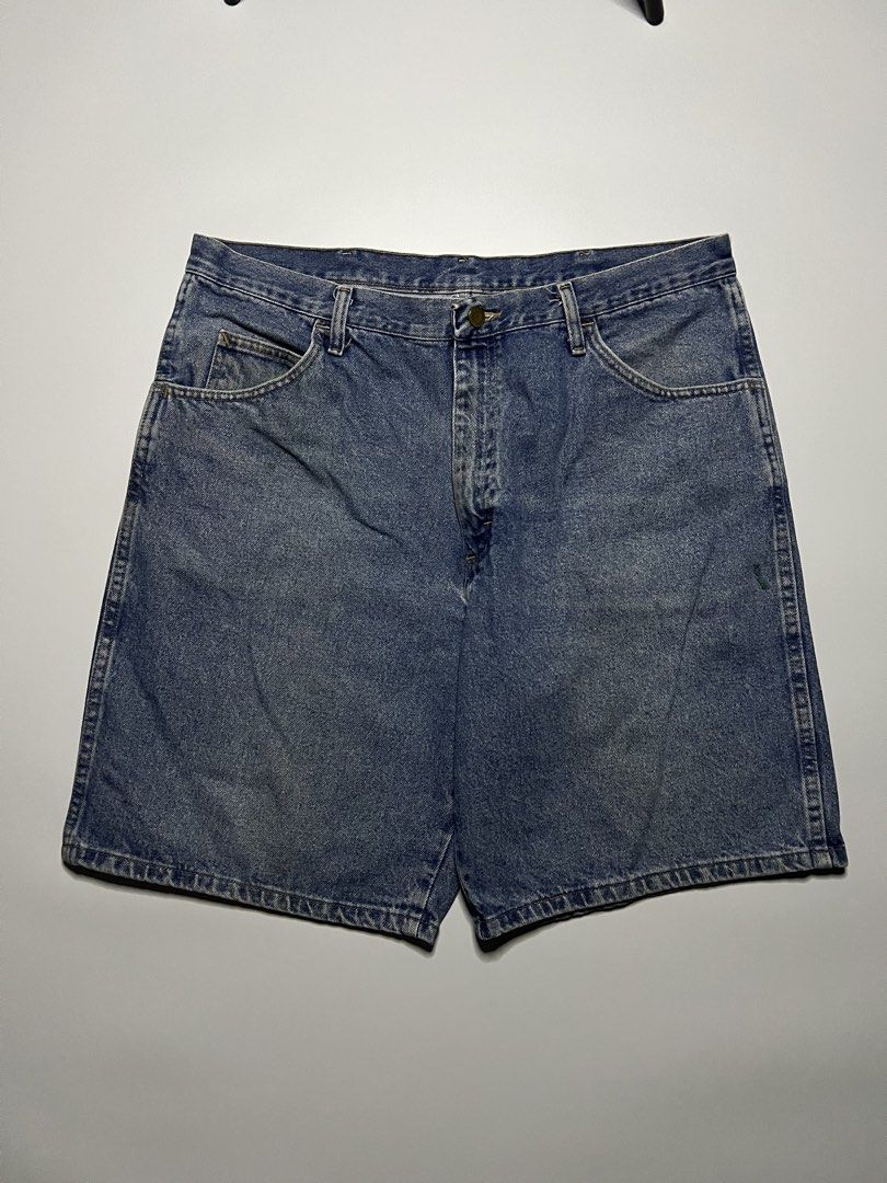 Wrangler Blue Denim Shorts Size 38 (Category: Shorts) located in Baler. Submitted by allthrifted31 (Listing ID 1467871060, Image 1). Description: Waist: 37 Length: 20.5 Hem: 12.5 Condition: Excellent Color rate: 10/10 Issue: None .
