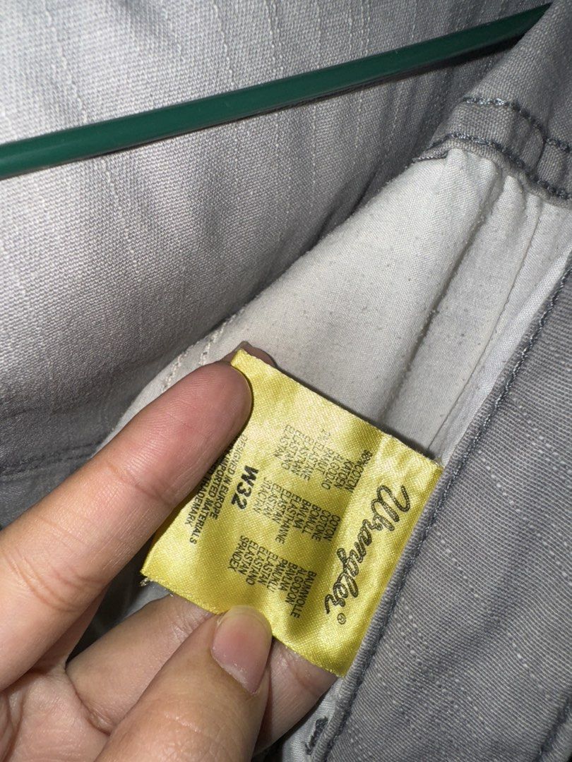 Wrangler Grey Denim Jeans Size W32 (Category: Jeans) located in La Trinidad. Submitted by prelovedandfindsbyji (Listing ID 1467929397, Image 3). Description: - Brand/Style: Wrangler Tina - Size: W32 - Color: Grey - Material: 98% cotton, 2% elastane blend for a comfortable stretch - Fit: Standard waist - Features: Iconic Wrangler back pocket stitching and sturdy fabric construction - Condition Note: Black leather brand patch near the waistband has