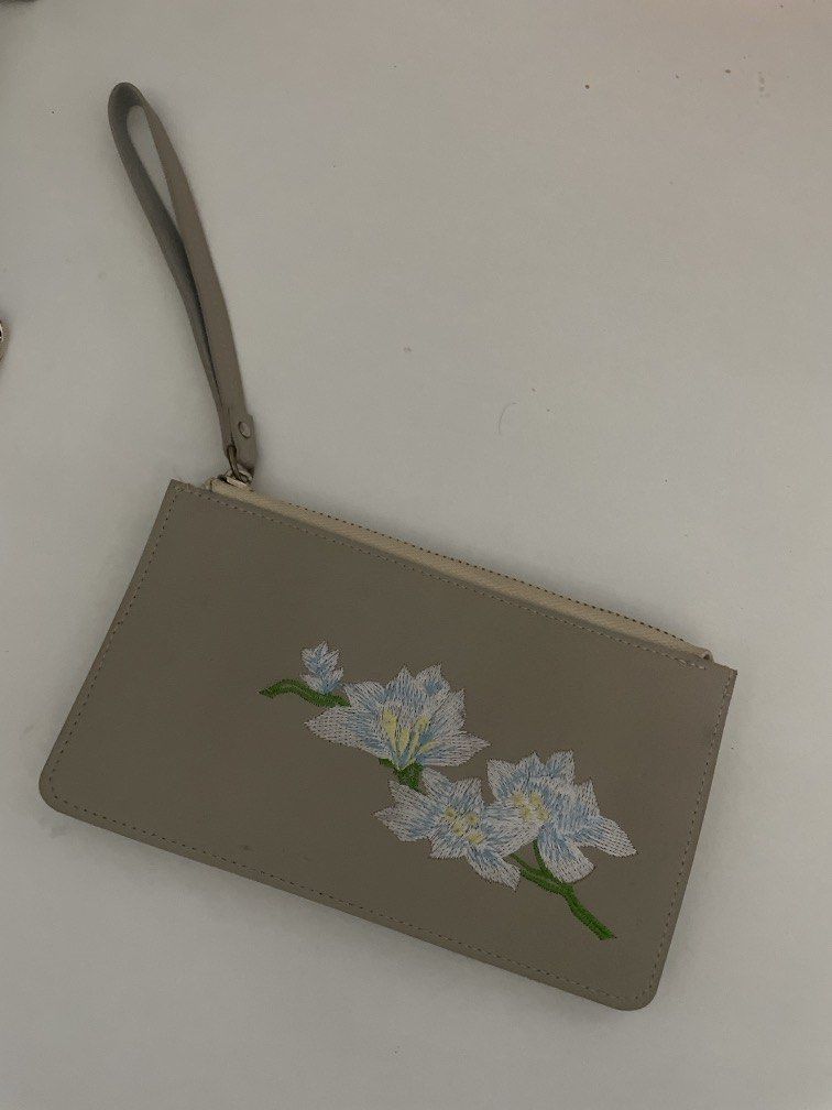 Wristlet with embroidered design (Category: Wallets & Card holders) located in Bacolor. Submitted by louiviellefinds (Listing ID 1467877404, Image 1). Description: Just a beautiful piece for your collection! Lots of compartments inside as shown in the photos.