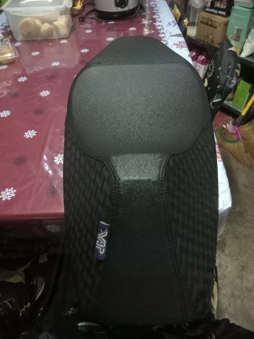 WVP Motorcycle Seat Cover (Category: Coats, Jackets and Outerwear) located in Quezon City. Submitted by madelrivera (Listing ID 1468003586, Image 1). Description: - Brand: WVP - Color: Classic Black - Design: Smooth top section with a stylish textured pattern on the sides - Condition: Brand new with tag attached - Installation: Plug and play, ready to install.