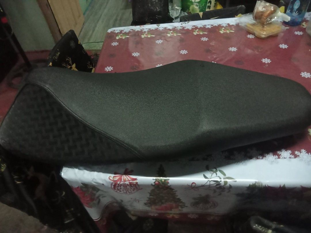 WVP Motorcycle Seat Cover (Category: Coats, Jackets and Outerwear) located in Quezon City. Submitted by madelrivera (Listing ID 1468003586, Image 2). Description: - Brand: WVP - Color: Classic Black - Design: Smooth top section with a stylish textured pattern on the sides - Condition: Brand new with tag attached - Installation: Plug and play, ready to install.