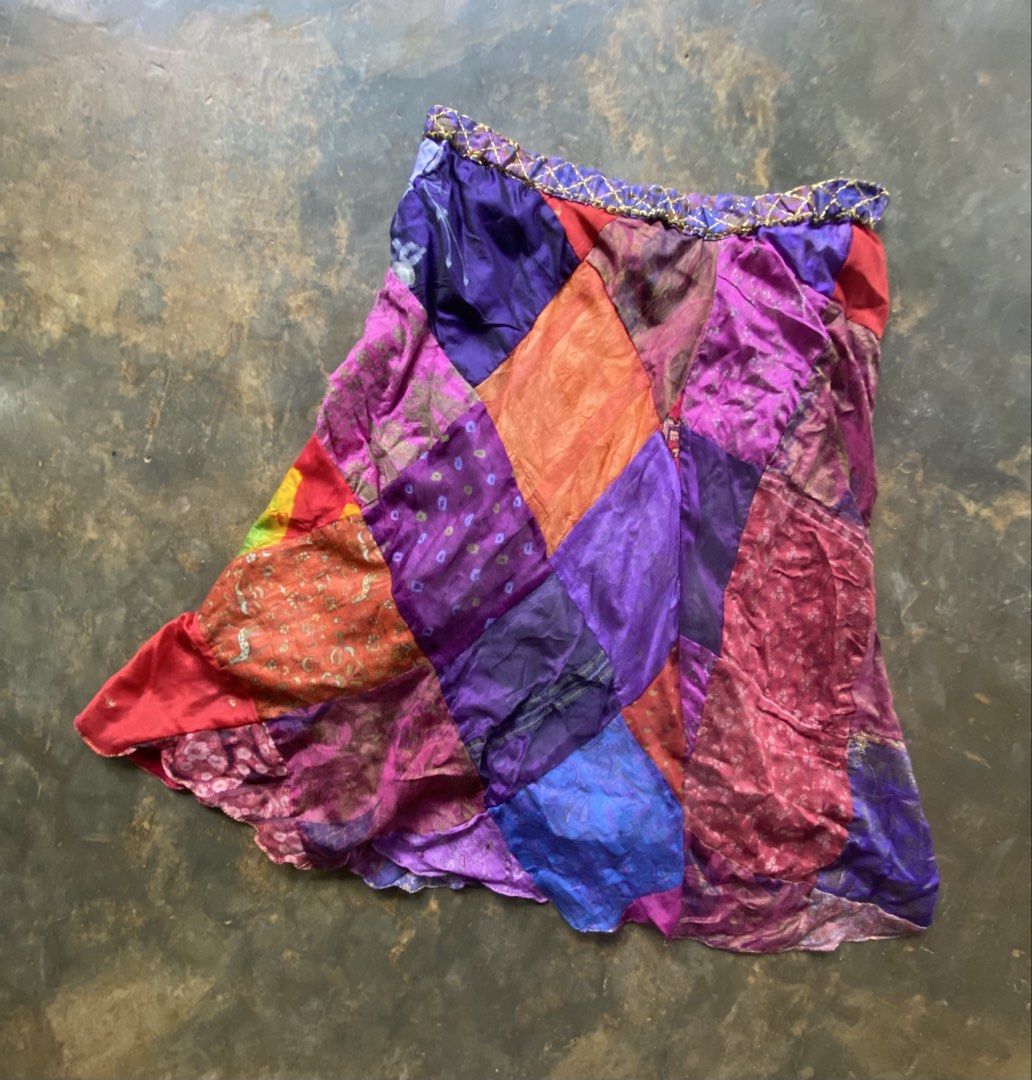 y2k Bohemian Patchwork Skirt (Category: Skirts) located in Dapitan. Submitted by bolandojh07634 (Listing ID 1468009174, Image 2). Description: - Style: Y2K Bohemian Patchwork Skirt - Size: Medium (EU 38 / UK 10 / US 26) - Color: Multi-color with rich jewel tones (purple, red, pink, orange, blue) - Design: Unique multi-print patchwork pattern with textured fabric - Condition: Good pre-loved condition (7/10) - Perfect for: Festivals, casual days ou