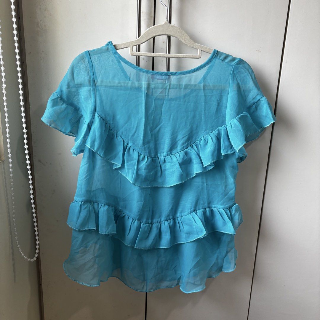 y2k top (Category: Blouses) located in Manila. Submitted by lavieelle (Listing ID 1468001430, Image 3). Description: - turquoise blue short chiffon blouse - bought internationally, no flaws - layered ruffled material, soft & flowy - best fit small to medium frames - rfs: decluttering .