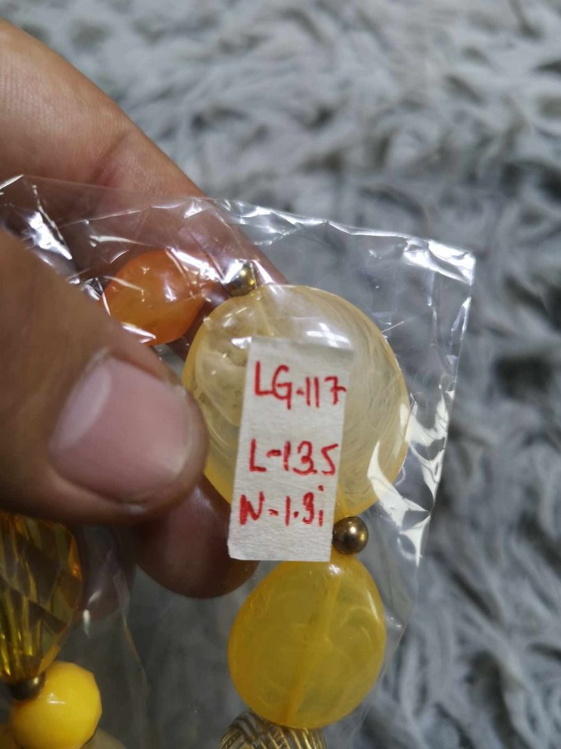 Yellow & Amber Toned Beaded Necklace (Category: Necklaces) located in Santa Cruz. Submitted by jmy_surplus.2 (Listing ID 1467910999, Image 3). Description: Size : L - 13.5 W - 1.3 Color : Yellow Type : Necklace Brand : No Brand Material : Pearl Style : Mix Of Faceted & Smooth Round Oval Flat Beads Necklace LG 117 JMY3 Batch #225.
