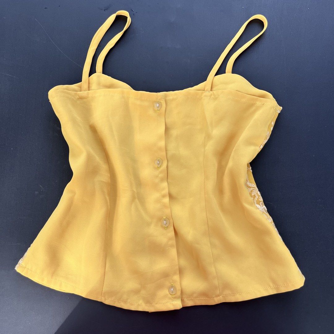 Yellow Embroidered Camisole Top | Size S–M (Category: Sleeveless) located in Surigao. Submitted by rynryngoaway (Listing ID 1467860840, Image 2). Description: yellow camisole top with floral embroidery and button details at the back. perfect for a coquette, feminine, or vintage-inspired outfit!.