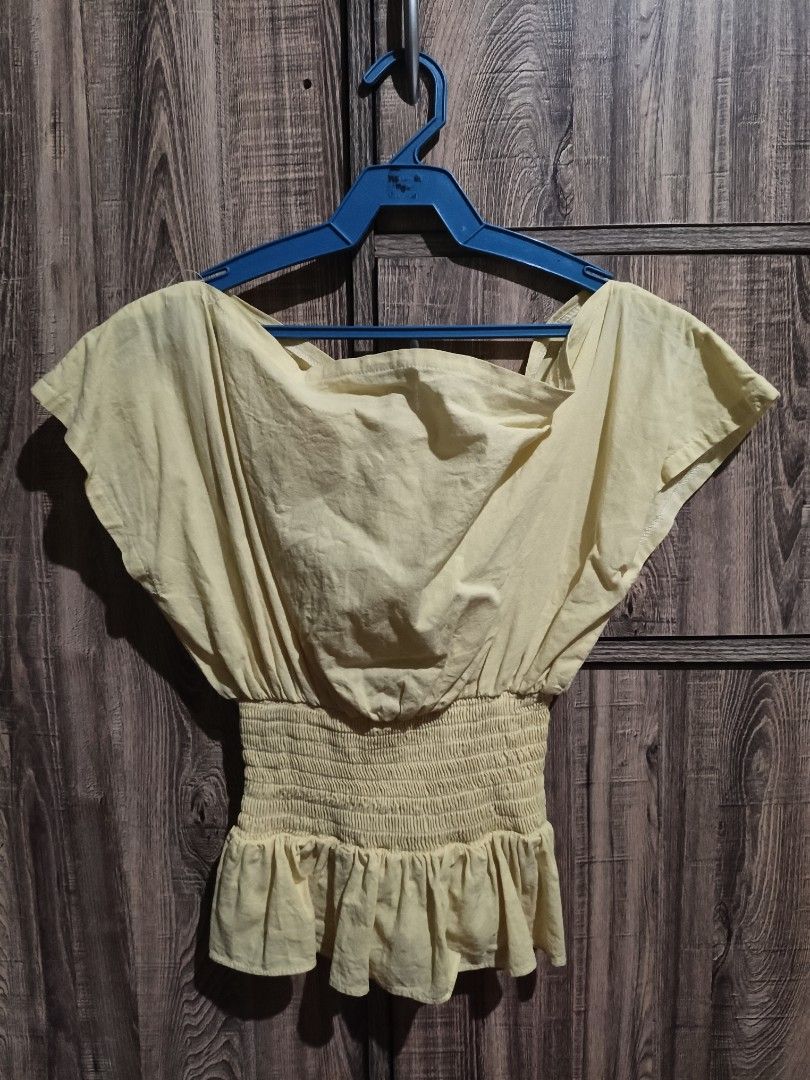 Yellow off-shoulder smocked waist top (Category: Blouses) located in Manila. Submitted by vivi.goodies (Listing ID 1468029615, Image 1). Description: .