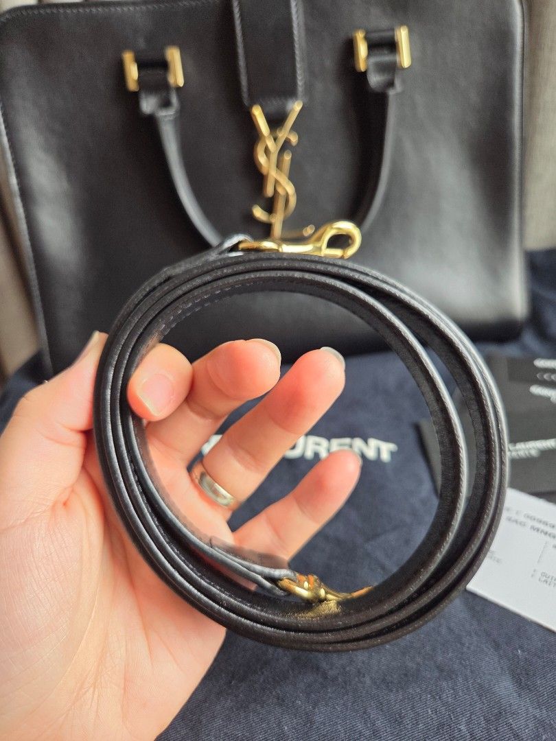 YSL Saint Laurent Cabas Black bag (Category: Luxury Bags & Wallets) located in Quezon City. Submitted by shop.mar.go (Listing ID 1467909576, Image 3). Description: preloved in excellent condition ysl cabas black gold hardware comes with dust bag, cards and strap very minor signs of usage interior & exterior. pls see last 2 photos..