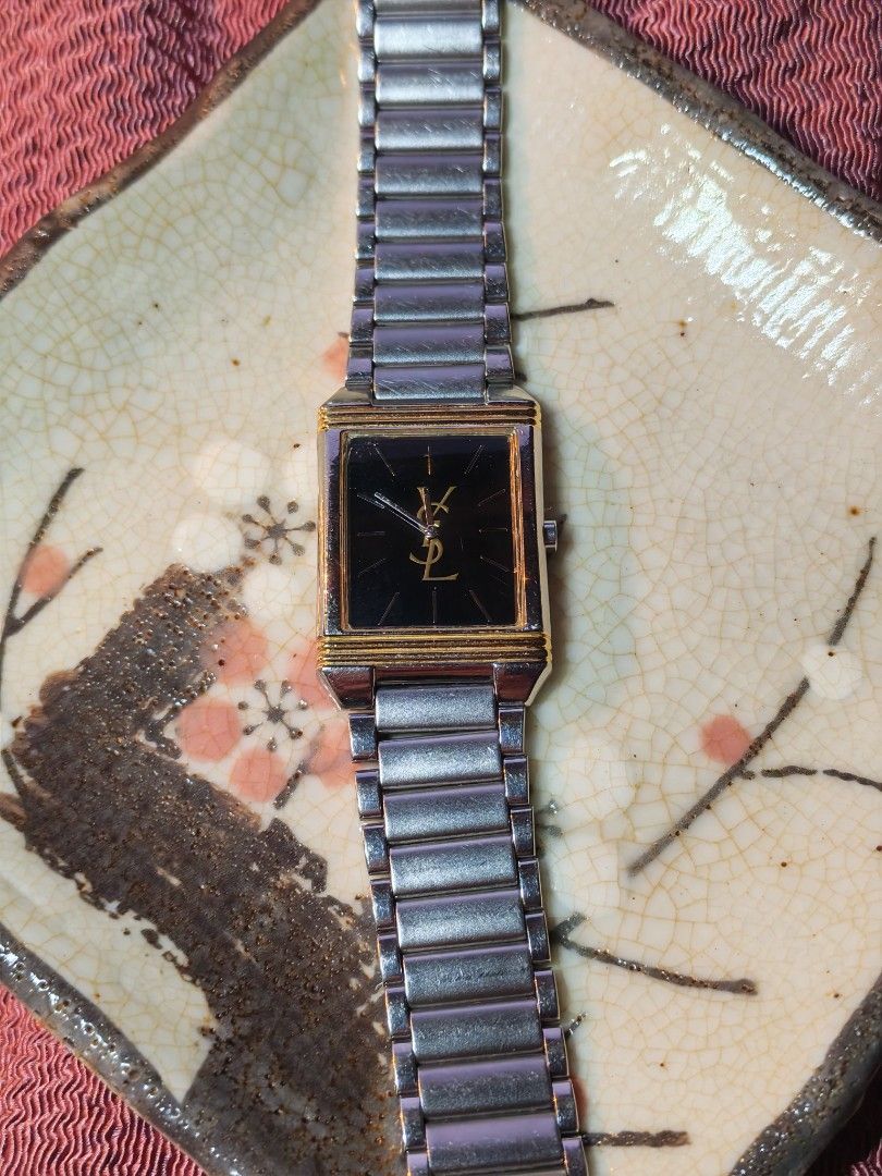 Yves Saint Laurent (YSL) (Category: Luxury Watches) located in Trece Martires City. Submitted by heirloomhoursph (Listing ID 1468016564, Image 1). Description: ✨ Heirloom Hours – Available Piece ✨ Yves Saint Laurent (YSL) Php 12,999 + sf Details: ■ Brand/Series: Yves Saint Laurent (YSL) ■ Model Number: 5421-H04724Y ■ Movement: Quartz ■ Design Origin: Japan ■ Case Size: 23mm ■ Wrist Size: 16.25m (max) ■ Condition: 10/10 ■ Comes with replacement bo