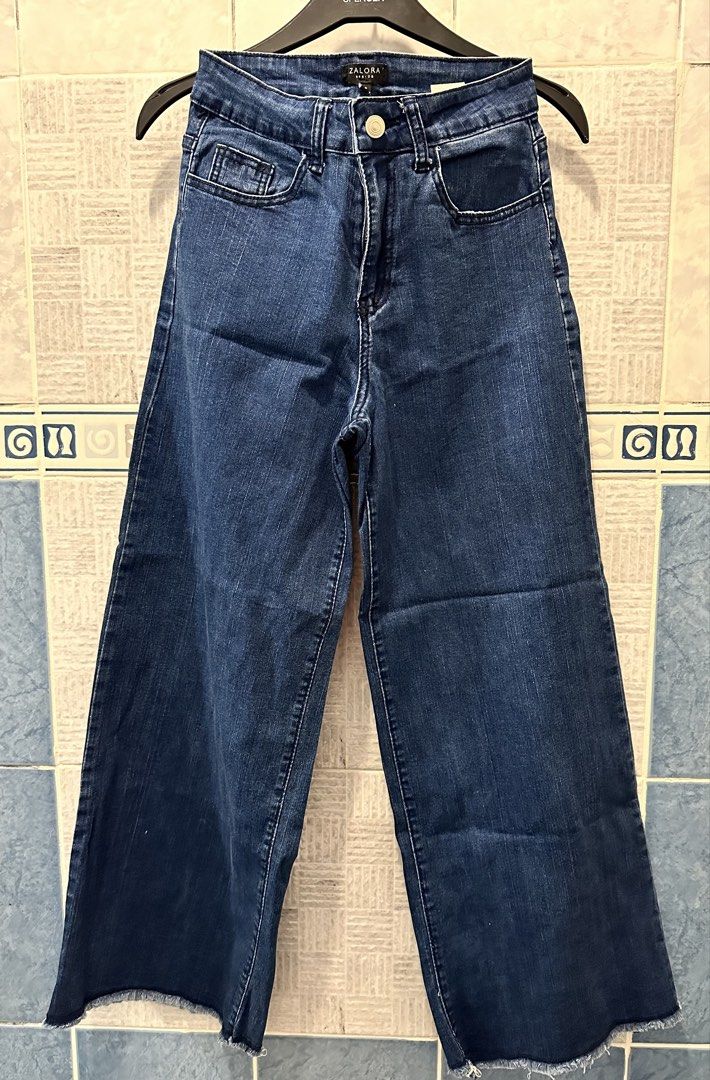 Zalora Basics Dark Blue Jeans Size S (Category: Jeans) located in Las Pinas. Submitted by weiwei_2424 (Listing ID 1467967501, Image 1). Description: - Brand: Zalora Basics - Size: Small - Color: Dark Blue - Fit: High-waisted with front button and zipper closure.