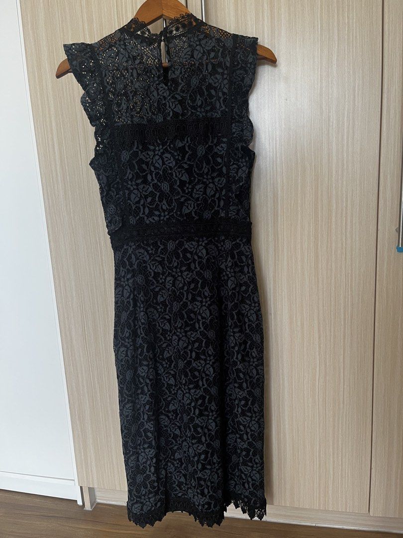 Zara Basic Black Lace Dress Size S (Category: Dresses) located in Manila. Submitted by lorenasant37621 (Listing ID 1467854976, Image 2). Description: - Brand: Zara Basic - Style: Black lace midi dress with mock neck and cap sleeves - Details: Intricate floral lace pattern, defined waistline with trim, and back button closure - Size: S (fits true to size) - Occasion: Ideal for dinners and evening events - Condition: Excellent.