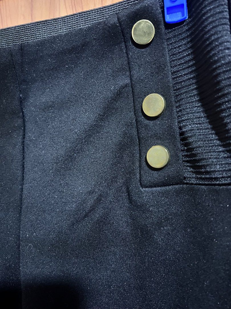 Zara Basic Collection Black Pants Size M (Category: Jeans) located in Manila. Submitted by wardrobeinmnl (Listing ID 1467878976, Image 3). Description: - Brand: Zara Basic Collection - Size: Medium (EUR M, USA M, MEX 28) - Color: Classic Black - Origin: Made in Turkey - Style: Comfortable pull-on pants with elastic waistband - Details: Trendy ribbed side panels and decorative gold-tone buttons on the front sides.