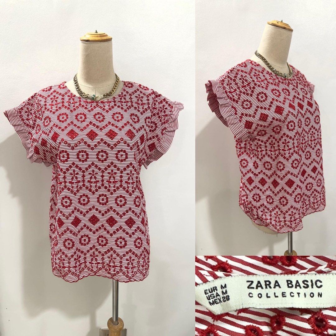 Zara Basic Collection Red White Pattern Blouse Size M (Category: Blouses) located in Bacolod City. Submitted by bhabissagal-05763 (Listing ID 1467873126, Image 1). Description: - Brand: Zara Basic Collection - Design: Red and white stripes with intricate patterned embroidery - Details: Round neckline, short ruffled sleeves, and scalloped hem - Size: EUR M, USA M, MEX 28 - Material: Lightweight and comfortable - Styling: Perfect for casual days ou