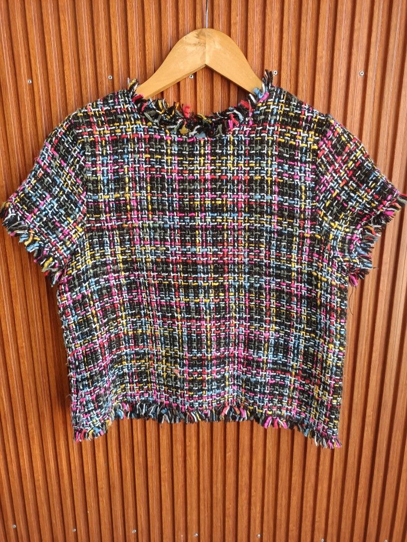 Zara Basic Multicolor Tweed Short Sleeve Top (Category: Blouses) located in Bayombong. Submitted by rheaaa00530 (Listing ID 1467959149, Image 1). Description: - Brand: Zara Basic - Style: Short sleeve tweed top - Material/Design: Textured woven fabric in black, pink, yellow, blue, and white - Details: Chic frayed raw edges on the round neckline and bottom hem - Origin: Made in Romania - Condition: Excellent.
