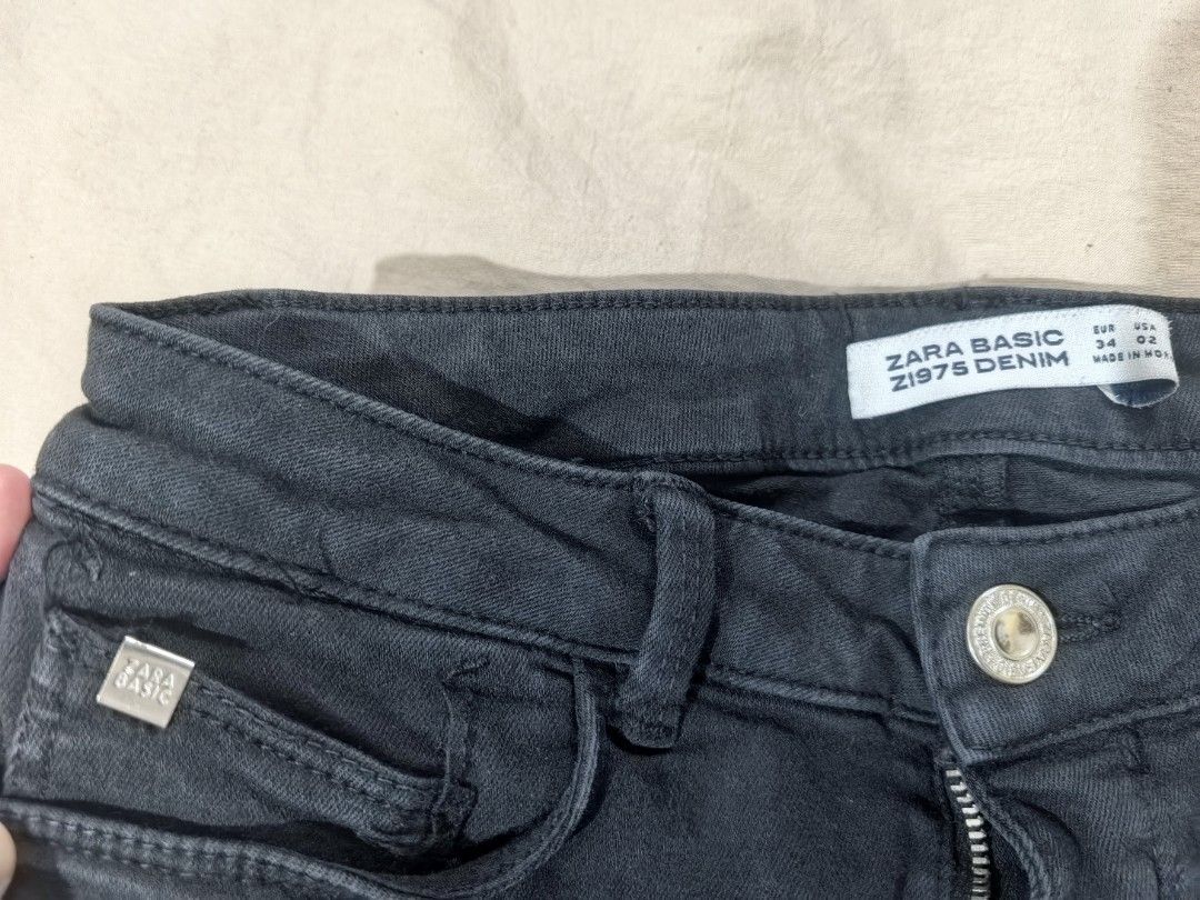 Zara Basic Z1975 Denim Black Skinny Jeans (Category: Jeans) located in Tacloban City. Submitted by thead.declutters (Listing ID 1467977408, Image 3). Description: - Brand: Zara Basic Z1975 - Fits: 8-10 years old - Style: Denim skinny jeans - Color: Washed black - Size: EUR 34 / US 2 - Rise: Mid-rise with metal button closure and zip fly - Pockets: Classic 5-pocket setup with branded hardware tag - Fit: Slim leg from thigh to ankle - Condition: Ex