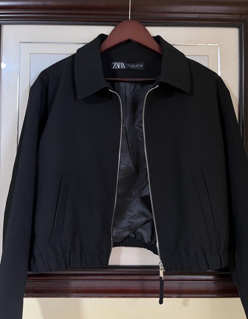 Zara Black Bomber Collared Jacket (Category: Others Tops) located in Taguig. Submitted by madeasoncloset (Listing ID 1467909997, Image 3). Description: New condition Worn only once sa Office Too many Jackets And WFH girlie here Size L ( runs small ) Width laid Flat Zip closed 22" Length 20".