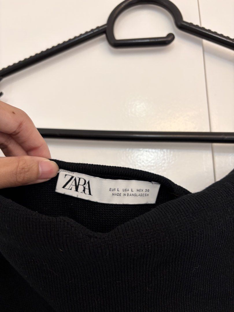 Zara Black Tube Top (Category: Sleeveless) located in Quezon City. Submitted by prelovedbynxkole (Listing ID 1467884639, Image 2). Description: - Brand: Zara - Style: Strapless tube top with sweetheart neckline - Material: Ribbed knit with great stretch - Size: Large (fits true to size) - Condition: Great basic piece for layering or wearing on its own ALL CLOTHES NEED TO BE WASHED & IRONED AS THEY HAVE BEEN SITTING IN STORAGE <3 Shipping from QC!