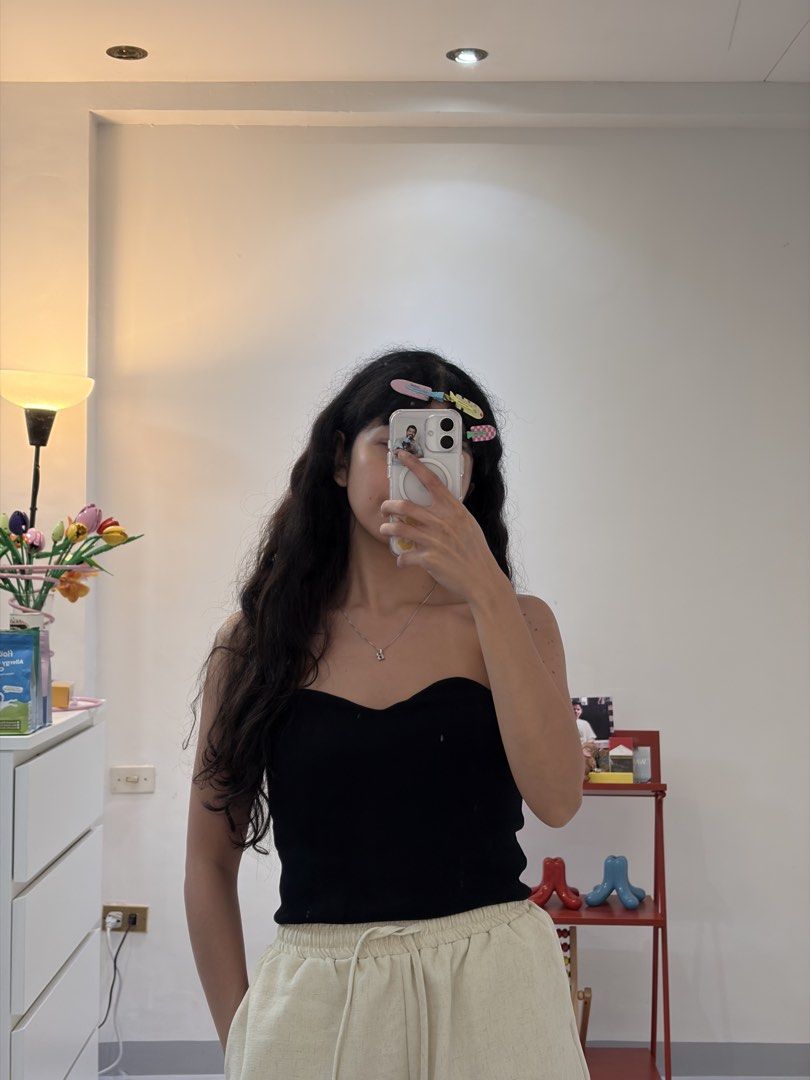 Zara Black Tube Top (Category: Sleeveless) located in Quezon City. Submitted by prelovedbynxkole (Listing ID 1467884639, Image 3). Description: - Brand: Zara - Style: Strapless tube top with sweetheart neckline - Material: Ribbed knit with great stretch - Size: Large (fits true to size) - Condition: Great basic piece for layering or wearing on its own ALL CLOTHES NEED TO BE WASHED & IRONED AS THEY HAVE BEEN SITTING IN STORAGE <3 Shipping from QC!