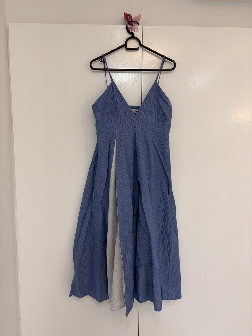 Zara Blue Midi Dress (Category: Dresses) located in Quezon City. Submitted by prelovedbynxkole (Listing ID 1467880296, Image 1). Description: - Brand: Zara - Size: S (Made in Morocco) - Color/Pattern: Blue with stripes - Design: V-neckline, thin spaghetti straps, flared skirt with a contrasting vertical panel - Condition: Worn once, excellent shape - Style Tip: Super easy to style for casual days out ALL CLOTHES NEED TO BE WASHED & IRONED AS THEY