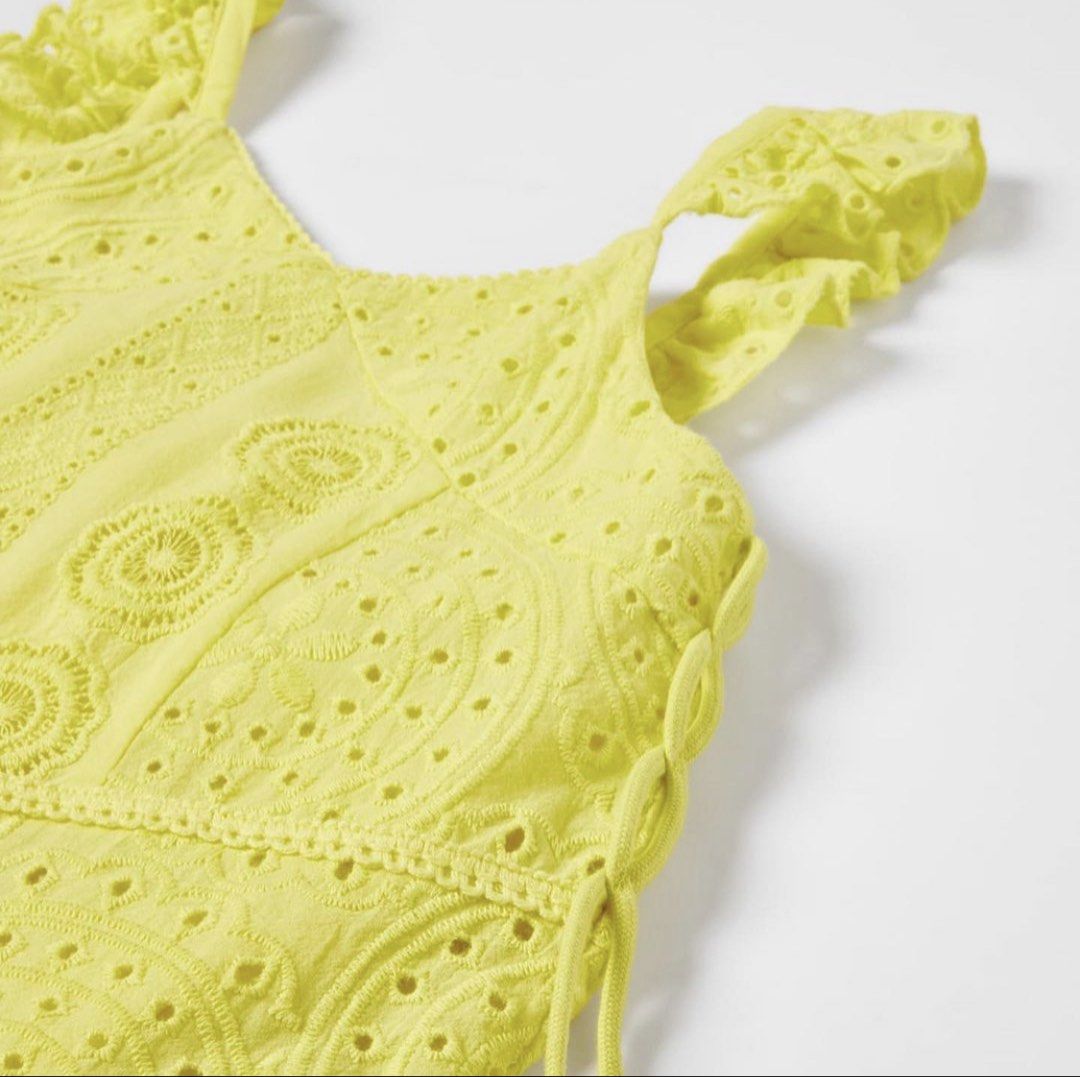 Zara Eyelet Ruffle Summer Dress (Category: Babies & Kids Fashion) located in Antipolo. Submitted by water.mellie (Listing ID 1467866835, Image 2). Description: - Brand new and authentic Zara dress, purchased from store for 2k+. Perfect brand new condition without flaws. - Size 11-12y, true to size - Bright yellow lightweight cotton dress - All-over intricate eyelet lace embroidery - Adorable ruffle shoulder straps - Trendy lace-up details along t