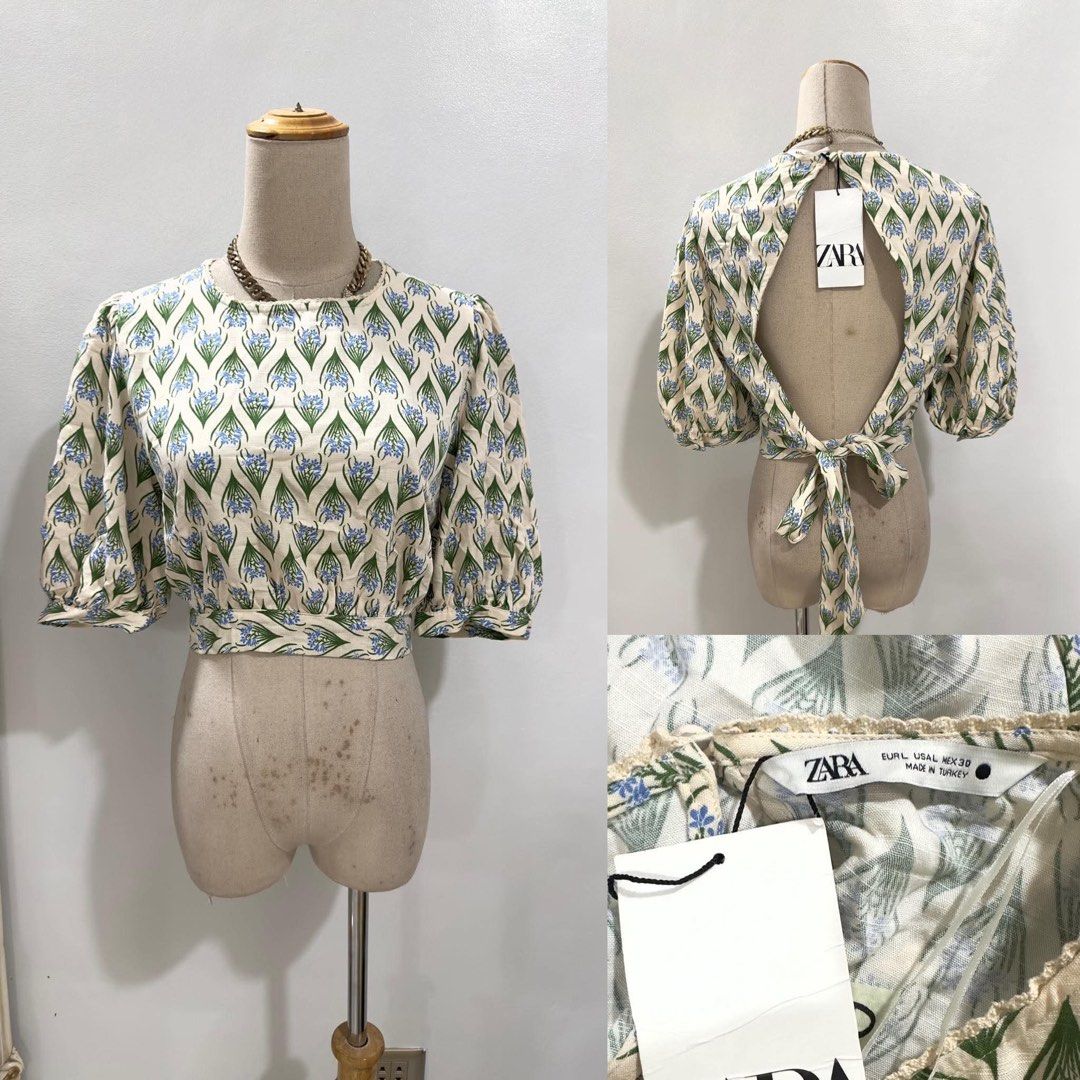 Zara Floral Print Open Back Crop Top (Category: Sleeveless) located in Bacolod City. Submitted by bhabissagal-05763 (Listing ID 1467873074, Image 1). Description: - Brand: Zara - Condition: Brand new with tags attached - Size: EUR XS / USA XS / MEX 26 - Design: Green and blue floral pattern - Details: Short puff sleeves, round neckline, open back with self-tie closure at the hem - Origin: Made in Turkey.