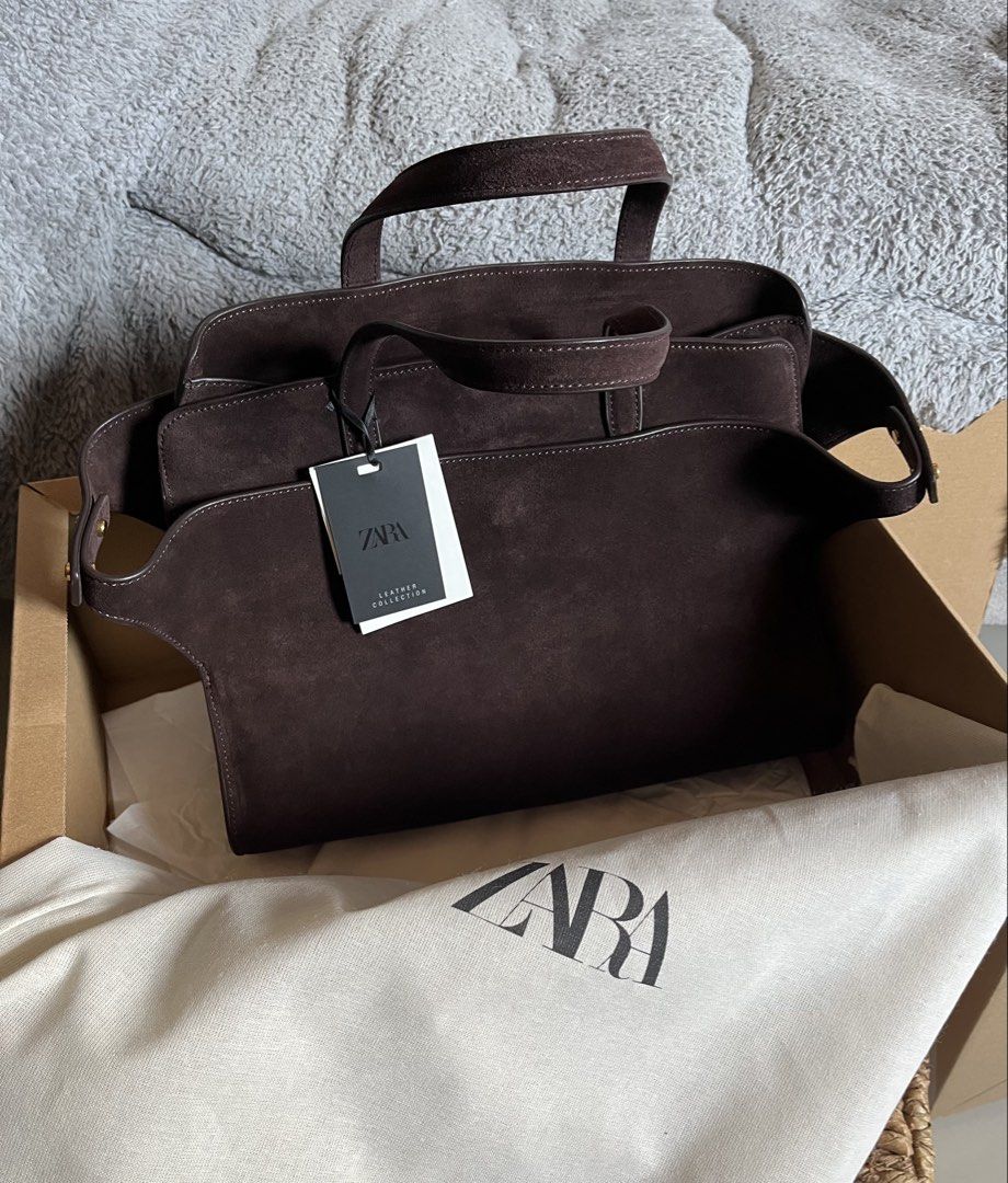 Zara Leather City Bag (Category: Purses & Pouches) located in Iba. Submitted by frommycloset2urs (Listing ID 1467917974, Image 1). Description: Authentic 💯❗️ New/ Unused (with hang tag) Suede in Chocolate Brown color Online purchased (receipt is posted as ref.) *Price is slightly negotiable. .