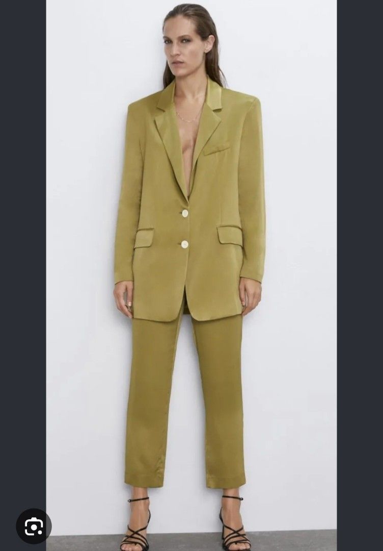 Zara Olive Green Satin Blazer (Category: Coats, Jackets and Outerwear) located in Manila. Submitted by PrinceDani.Clothing (Listing ID 1467964189, Image 2). Description: - Brand: Zara - Color: Olive green - Material: Smooth satin fabric with a slight sheen - Design: Structured shoulders, notched lapels, front button closure - Pockets: Flap pockets at sides, one chest pocket - Interior: Fully lined - Condition: Clean and well-kept - Versatility: G