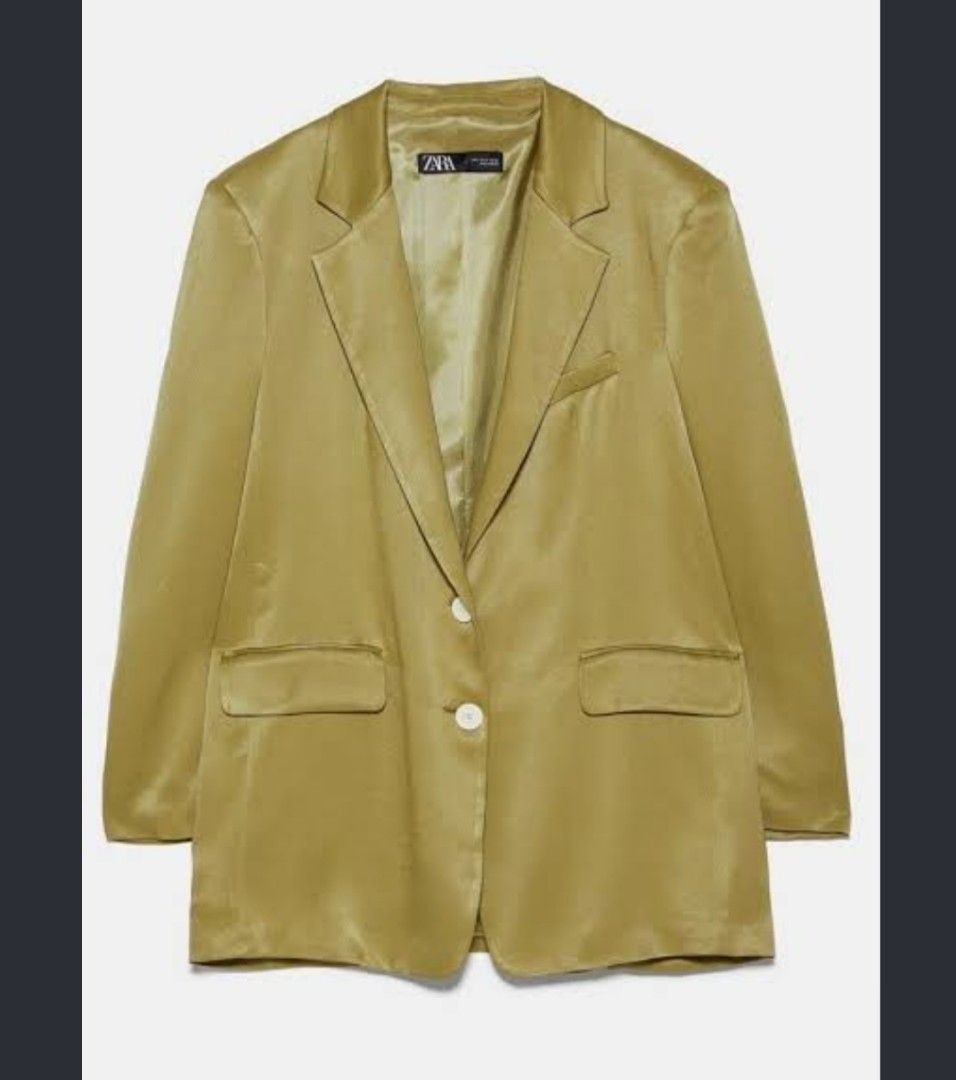 Zara Olive Green Satin Blazer (Category: Coats, Jackets and Outerwear) located in Manila. Submitted by PrinceDani.Clothing (Listing ID 1467964189, Image 3). Description: - Brand: Zara - Color: Olive green - Material: Smooth satin fabric with a slight sheen - Design: Structured shoulders, notched lapels, front button closure - Pockets: Flap pockets at sides, one chest pocket - Interior: Fully lined - Condition: Clean and well-kept - Versatility: G