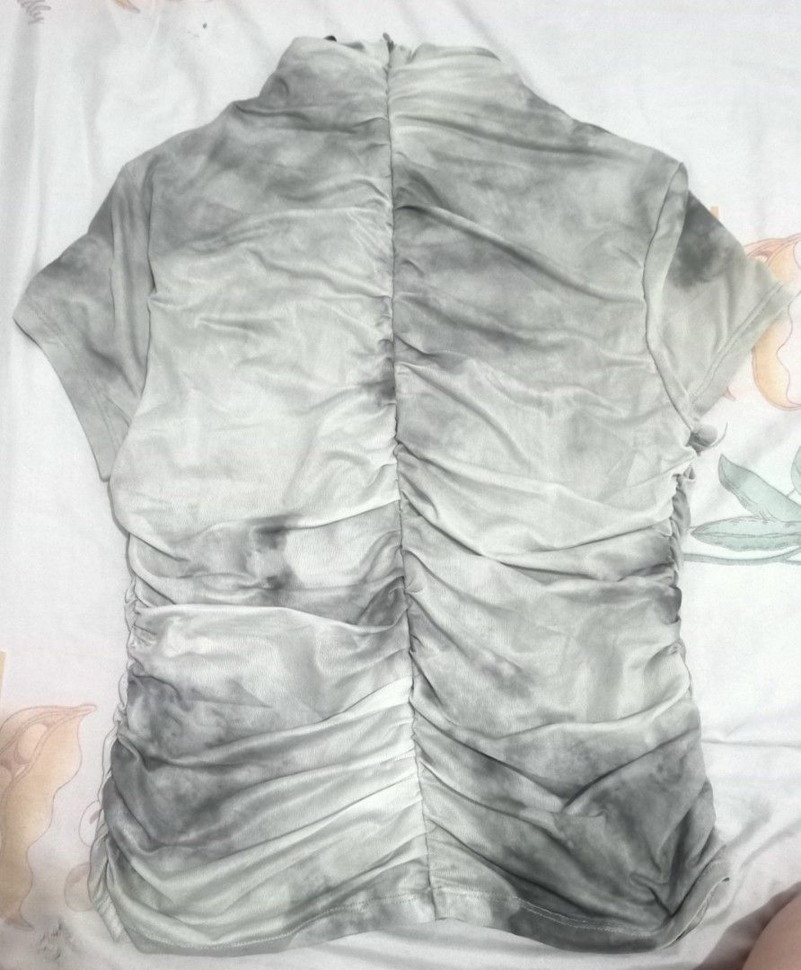 Zara Ruched Tie-Dye Mesh Top (Category: Sleeveless) located in Makati City. Submitted by gonzalesde66090 (Listing ID 1467967830, Image 2). Description: - Brand: Zara - Size: L (Made in Portugal) - Color/Print: Green and grey tie-dye - Material: Stretchy mesh fabric - Features: Mock neck, short sleeves, ruched front and back seams, back zipper closure - Condition: Worn once, basically good as new.