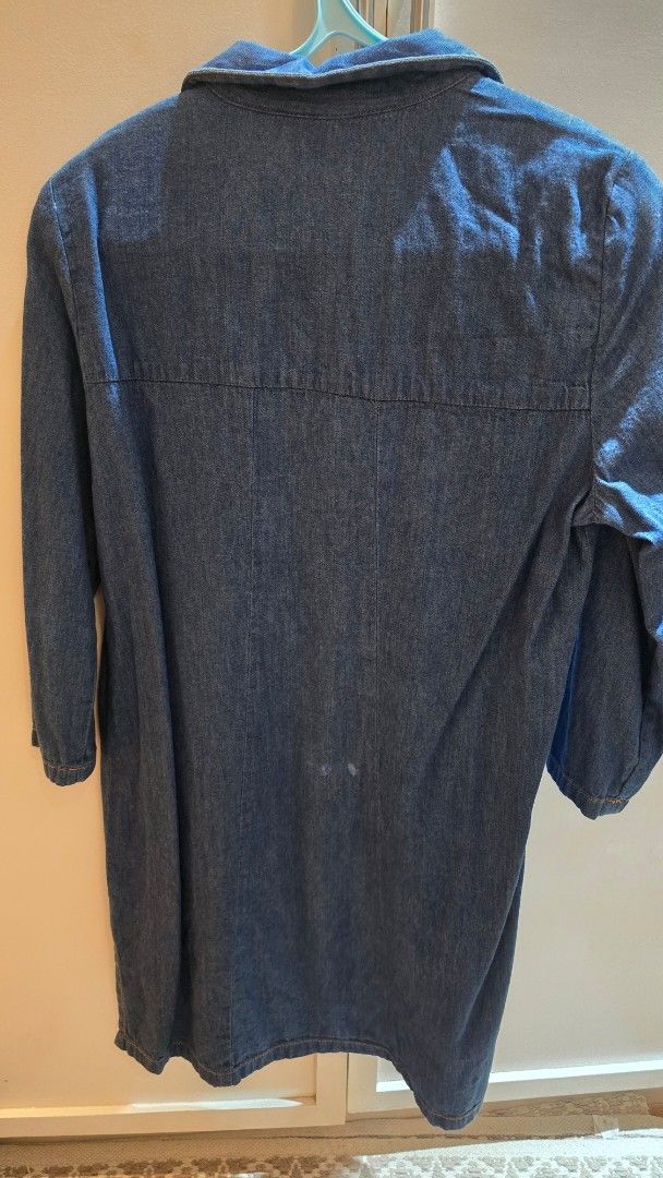 Zara Trafaluc Denim Dress (Category: Dresses) located in Cebu City. Submitted by kitty_12345_ (Listing ID 1468007148, Image 2). Description: - Brand: Zara Trafaluc - Size: M (EUR M, USA M, MEX 28) - Color: Blue denim - Design: Button-up front with collar, left chest pocket, and playful sewn-on patches (hearts, letters, abstract designs) - Sleeves: Long sleeves - Condition: good condition, there's a white stain at the back but its not that noticea