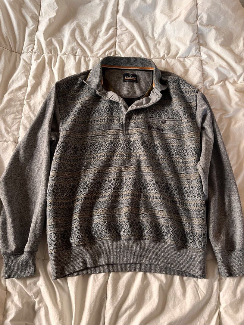 Zealzip Grey Patterned Quarter Button Sweater Size L (Category: Coats, Jackets and Outerwear) located in Manila. Submitted by miyu.ga (Listing ID 1467919717, Image 1). Description: - Brand: Zealzip - Color: Grey with intricate Nordic knit pattern - Size: Large - Details: Quarter button closure, foldover collar, subtle orange piping on inner collar - Fit: Ribbed cuffs and hem for a snug fit - Condition: Great cold weather staple.