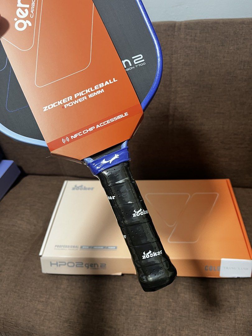 Zocker HPO2 Gen 2 Hypercontrol Power 16mm Pickleball Paddle (Category: Racket and Ball Sports) located in Manila. Submitted by thefootyhub (Listing ID 1467920190, Image 2). Description: - Brand new in original box with tags attached - Model: Zocker HPO2 Gen 2 Power (16mm) - Surface: Premium T700 Raw Carbon for maximum spin and control - Core: High-density PP honeycomb core for enhanced power - Tech: Built-in NFC chip accessible - Design: Eye-catc