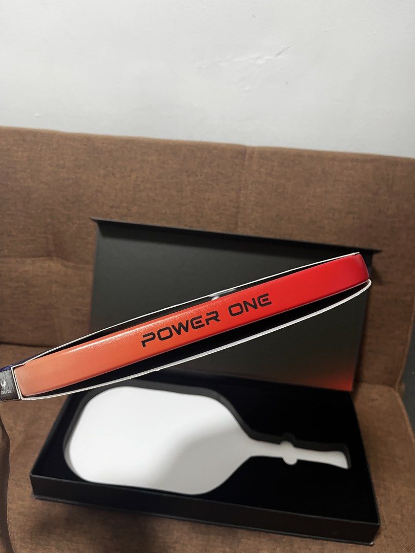 Zocker One Power Pickleball Paddle (Category: Racket and Ball Sports) located in Manila. Submitted by thefootyhub (Listing ID 1467920865, Image 3). Description: NEGOTIABLE - Brand: Zocker One Power - Condition: Brand new in original box - Color: Blue and black with white perforated grip tape - Weight: Average 8.0 to 8.15 oz - Dimensions: 16.3" length x 7.5" width (5.2" grip length) - Certification: UPA Pro certified.