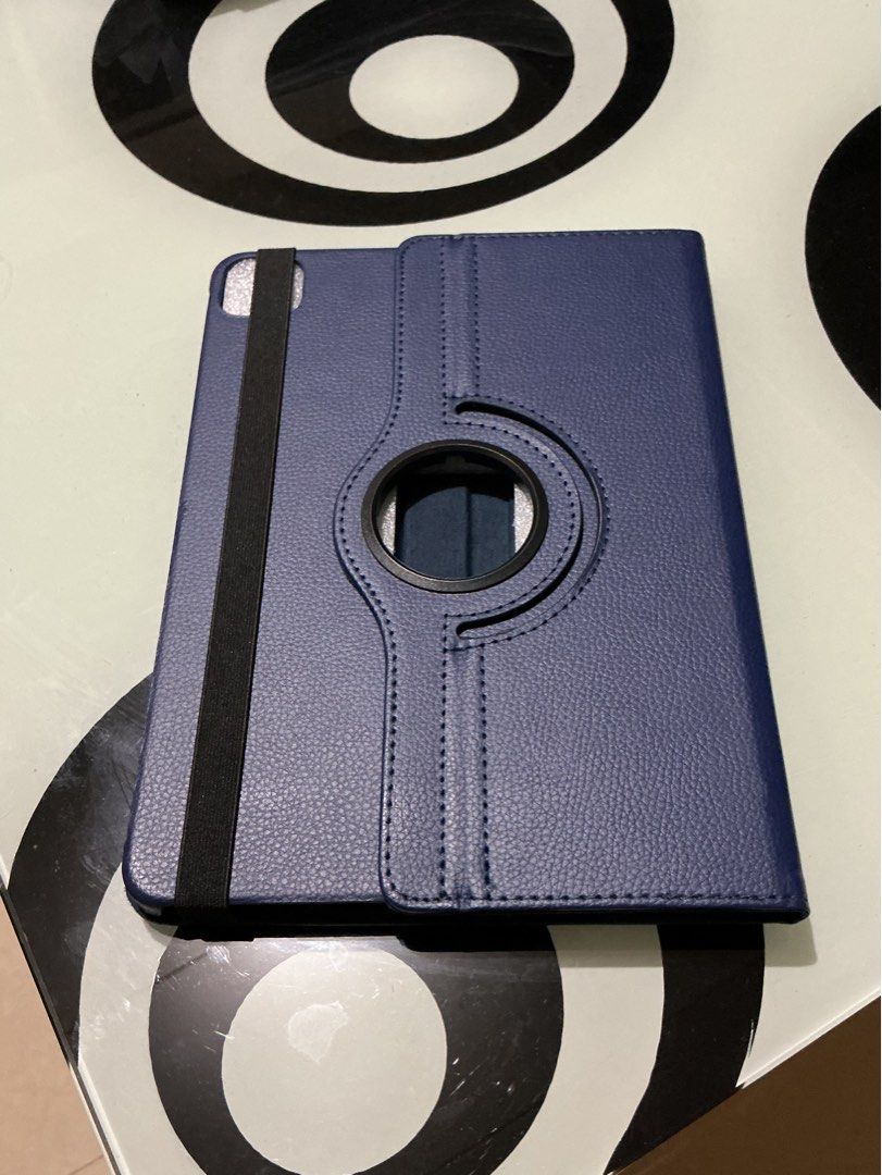 10.9/ 11 inches Ipad Case (alibaba) (Category: Cases & Sleeves) located in Bulacan. Submitted by toogoodtobegarbage (Listing ID 1468183592, Image 2). Description: - Compatibility: 10.9 / 11 inches iPad models - Color: Navy Blue - Material: Premium PU leather with textured finish - Features: 360-degree rotation for landscape and portrait viewing, multiple stand angles - Security: Elastic band closure to keep case securely closed - Condition: Brand