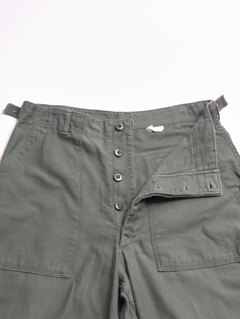 1962 Early Pattern OG107 Utility Trousers - Medium (Category: Trousers) located in Cabuyao City. Submitted by luckyboy.goods (Listing ID 1468200731, Image 2). Description: An original early-pattern U.S. Army OG-107 Utility Trouser, featuring the distinctive adjustable waist tabs found on earlier production examples. Introduced in the 1950s, the OG-107 became a staple of American military uniforms, valued for its durable cotton sateen construction