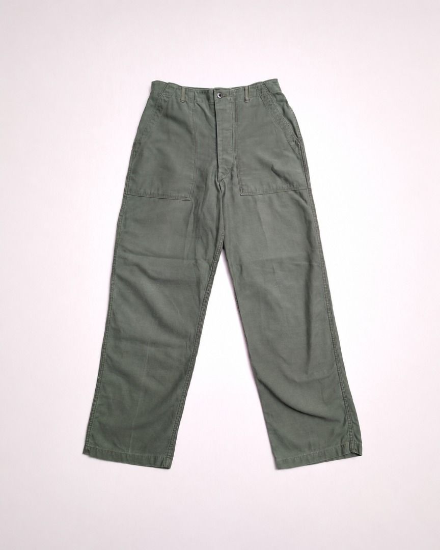 1962 Early Pattern OG107 Utility Trousers - Medium (Category: Trousers) located in Cabuyao City. Submitted by luckyboy.goods (Listing ID 1468200731, Image 1). Description: An original early-pattern U.S. Army OG-107 Utility Trouser, featuring the distinctive adjustable waist tabs found on earlier production examples. Introduced in the 1950s, the OG-107 became a staple of American military uniforms, valued for its durable cotton sateen construction