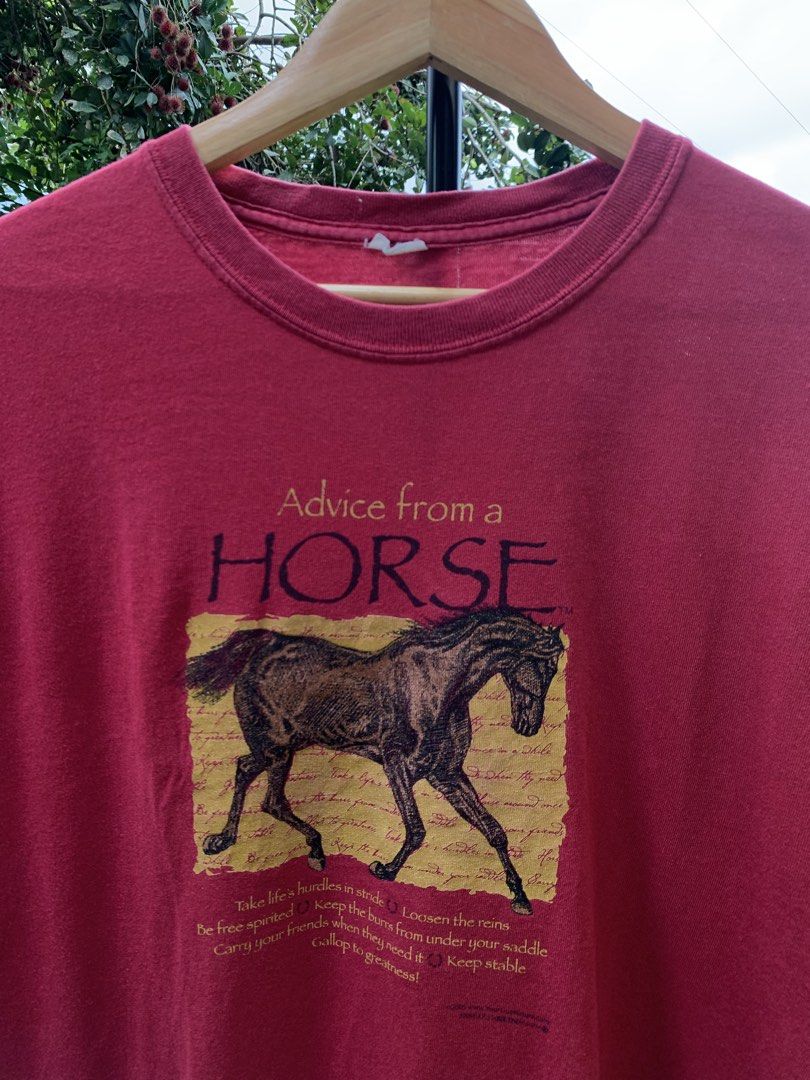 2005 Horse statement tee (Category: Tshirts & Polo Shirts ) located in Cagayan de Oro. Submitted by premium_thrifts (Listing ID 1468174505, Image 1). Description: Burgundy colorway. Good condition. Double stitch on both sleeves and hem Fits XL L28.5" x W23" 22" (shoulder to shoulder) 7.1" (sleeve length) Issue: cut tag, slight fade spots under the graphic, and on some parts Add shipping fee (via JRS or J&T).