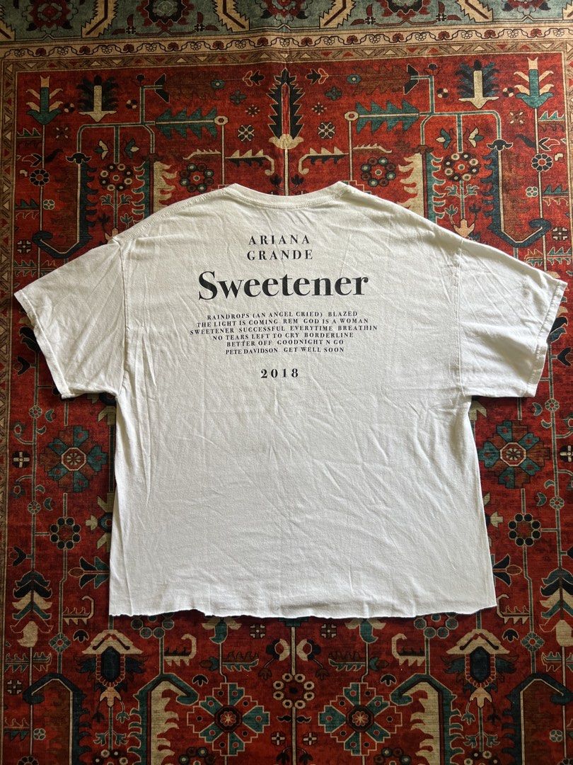 2018 Ariana Grande Sweetener White Tee (Category: Tshirts & Polo Shirts ) located in Imus. Submitted by the1994thriftshop.ph (Listing ID 1468177441, Image 2). Description: 2018 Ariana Grande Sweetener White Tee Size: XL Pit to pit: 23.8 inches Top to bottom: 27.3-27.8 inches Cropped raw hem and minor lints issues Price: Php 800.