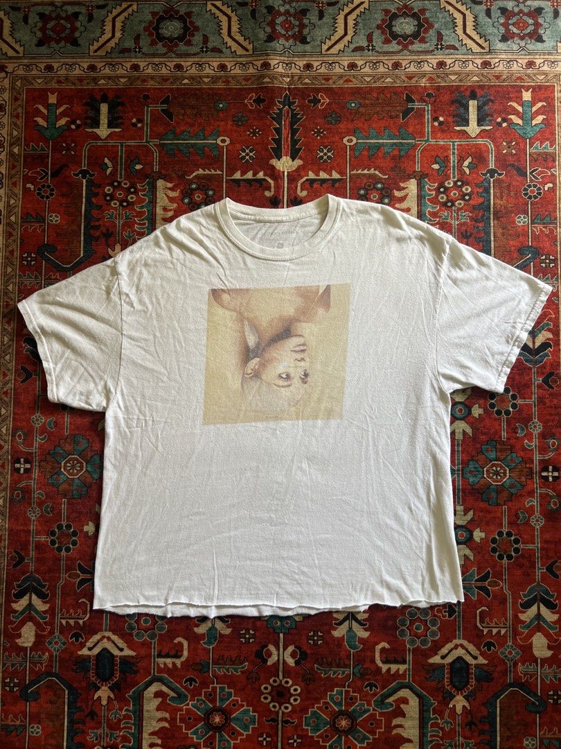 2018 Ariana Grande Sweetener White Tee (Category: Tshirts & Polo Shirts ) located in Imus. Submitted by the1994thriftshop.ph (Listing ID 1468177441, Image 1). Description: 2018 Ariana Grande Sweetener White Tee Size: XL Pit to pit: 23.8 inches Top to bottom: 27.3-27.8 inches Cropped raw hem and minor lints issues Price: Php 800.