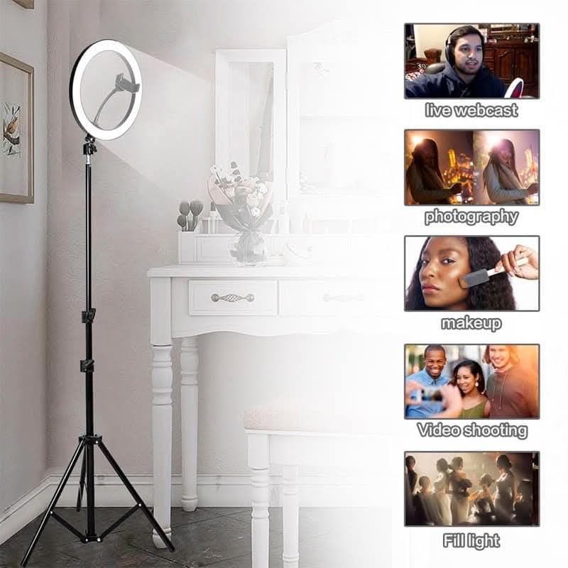 36cm LED Ring Light with Tripod Stand (Category: Lighting & Studio Equipment) located in Manila. Submitted by iliasjen3082126 (Listing ID 1468142484, Image 2). Description: - Size: 36cm large diameter with 288 bright LED beads - Lighting: Soft light output with smooth, stepless dimming controls - Stand: Includes a sturdy, adjustable tripod stand - Convenience: Comes with a center-mounted smartphone holder - Uses: Ideal for live webcasting, makeup