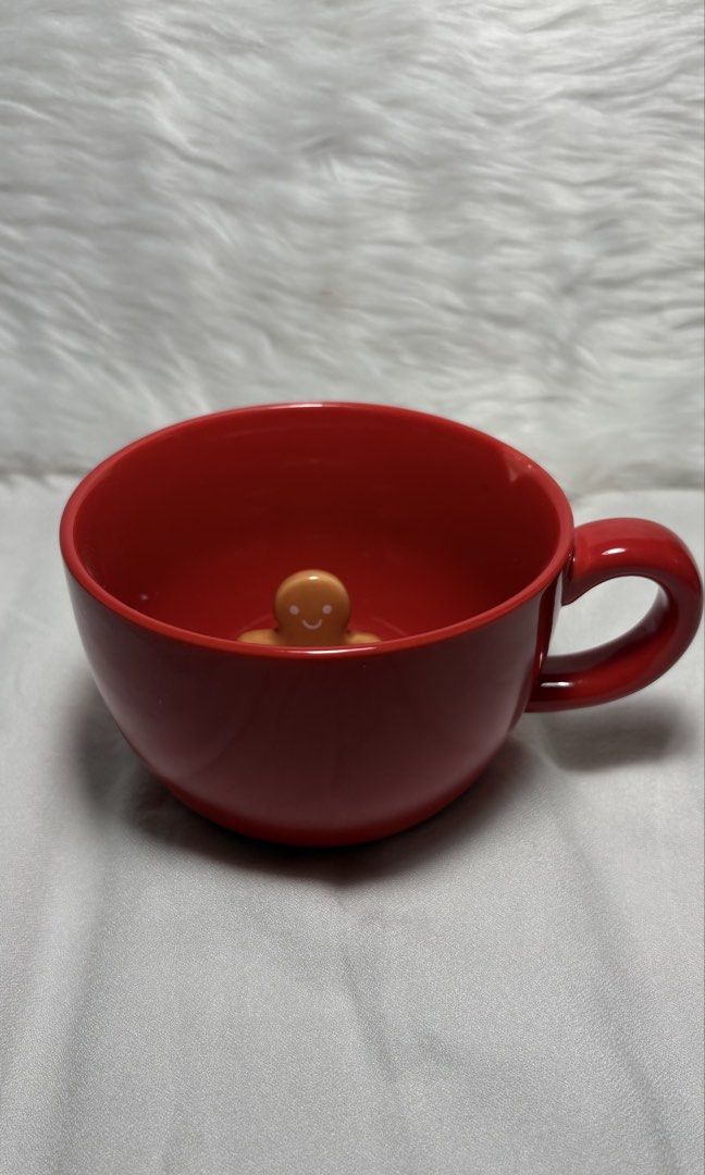 3D Hidden Gingerbread Man Red Festive Mug (Category: Coffee & Tea Tableware) located in Manila. Submitted by mug.aras (Listing ID 1468223477, Image 1). Description: Get into the holiday spirit with this vibrant red ceramic mug! Features an adorable hidden 3D gingerbread man figurine at the bottom that peeks out as you drink. Perfect for festive hot cocoa or Christmas gifting..