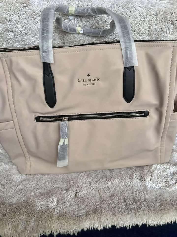 ♠️ KATE SPADE ♠️ WEEKENDER BAG WITH STRAP (Category: Cross-body Bags) located in Cavinti. Submitted by shop_withme23 (Listing ID 1468281616, Image 1). Description: Onhand item Full payment required No cancellation of order No rush shipping Additional shipping fee.