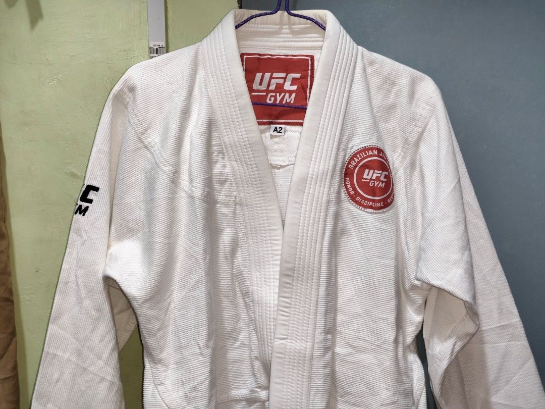 A2 - UFC GYM WHITE BJJ GI UPPER ONLY (Category: Combat Sports) located in Taguig. Submitted by mmthriftshop.ph (Listing ID 1468279335, Image 2). Description: 🥋A2 - UFC GYM WHITE BJJ GI UPPER ONLY 💵 1,200.00 + SF ❌ NO COD/COP ✅ Payment first policy 🏷️ Like new condition, just need wash only. 📦 SF : ➡️ Lalamove ➡️ J&T Express 💳 MOP : ➡️ GCash ➡️ GoTyme ➡️ MariBank ➡️ BPI Bank Transfer.