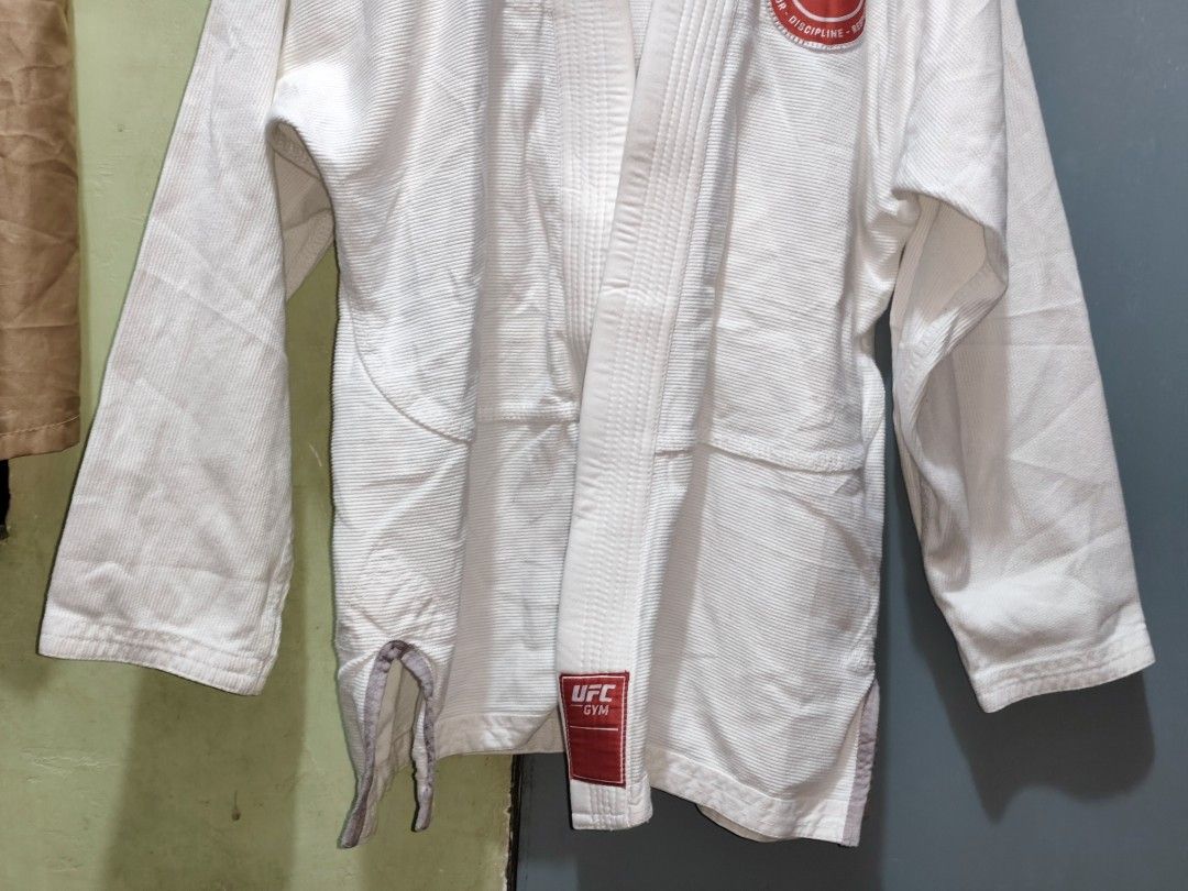 A2 - UFC GYM WHITE BJJ GI UPPER ONLY (Category: Combat Sports) located in Taguig. Submitted by mmthriftshop.ph (Listing ID 1468279335, Image 3). Description: 🥋A2 - UFC GYM WHITE BJJ GI UPPER ONLY 💵 1,200.00 + SF ❌ NO COD/COP ✅ Payment first policy 🏷️ Like new condition, just need wash only. 📦 SF : ➡️ Lalamove ➡️ J&T Express 💳 MOP : ➡️ GCash ➡️ GoTyme ➡️ MariBank ➡️ BPI Bank Transfer.