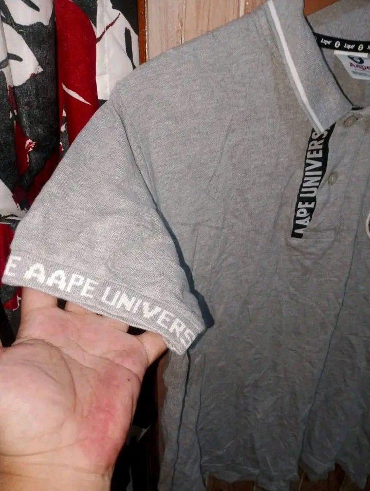 AAPE (Category: Tshirts & Polo Shirts ) located in Taguig. Submitted by clothingselection (Listing ID 1468081072, Image 3). Description: PTPA AAPE POLO SHIRT 21 X 27 FRONT X 28 BACK VERYGOOD CONDITION NID WASH FRESH FROM BALE WASHABLE STAIN SEE LAST PHOTO.