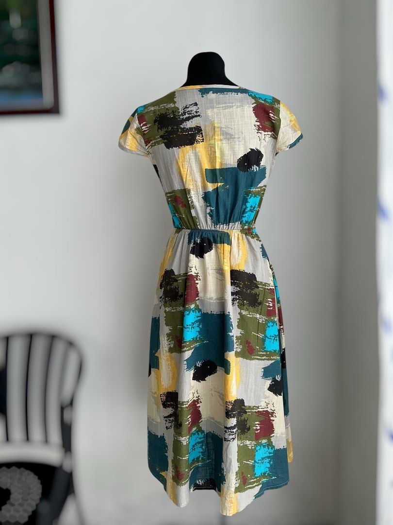 Abstract Patchwork Peasant Dress (Small) (Category: Dresses) located in Quezon City. Submitted by engeleaize (Listing ID 1468135049, Image 2). Description: Details: Color: Multicolor Style: Boho style peasant midi dress, abstract brushstroke patterns, short sleeves, crew neckline, decorative buttons, elastic waistline, with bottom inner lining Fabric: Cotton-poly blend Best worn: Garden parties, resort wear, casual daytime wear Bust: 34 inches Wa