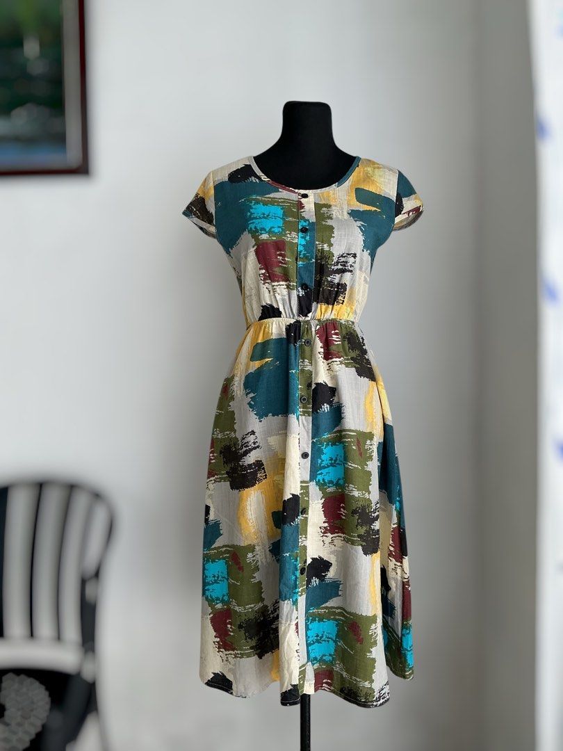 Abstract Patchwork Peasant Dress (Small) (Category: Dresses) located in Quezon City. Submitted by engeleaize (Listing ID 1468135049, Image 1). Description: Details: Color: Multicolor Style: Boho style peasant midi dress, abstract brushstroke patterns, short sleeves, crew neckline, decorative buttons, elastic waistline, with bottom inner lining Fabric: Cotton-poly blend Best worn: Garden parties, resort wear, casual daytime wear Bust: 34 inches Wa