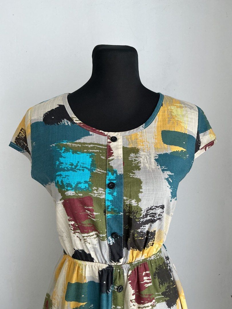Abstract Patchwork Peasant Dress (Small) (Category: Dresses) located in Quezon City. Submitted by engeleaize (Listing ID 1468135049, Image 3). Description: Details: Color: Multicolor Style: Boho style peasant midi dress, abstract brushstroke patterns, short sleeves, crew neckline, decorative buttons, elastic waistline, with bottom inner lining Fabric: Cotton-poly blend Best worn: Garden parties, resort wear, casual daytime wear Bust: 34 inches Wa