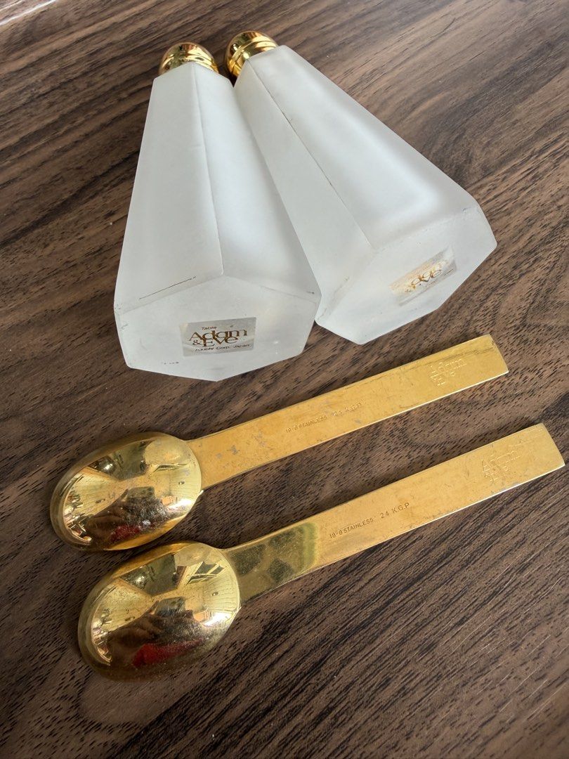 Adam & Eve Table Ware Salt Pepper Shakers with Spoons (Category: Dinnerware & Cutlery) located in Digos. Submitted by old_soul. (Listing ID 1468097873, Image 3). Description: - Authentic vintage Adam & Eve tableware set by Hikichi Corp Japan - Includes 2 frosted glass salt and pepper shakers with gold-tone tops - Features original brand stickers on the bottom of the shakers - Comes with 2 matching spoons marked 18-8 stainless steel and 24 k.g.p. 