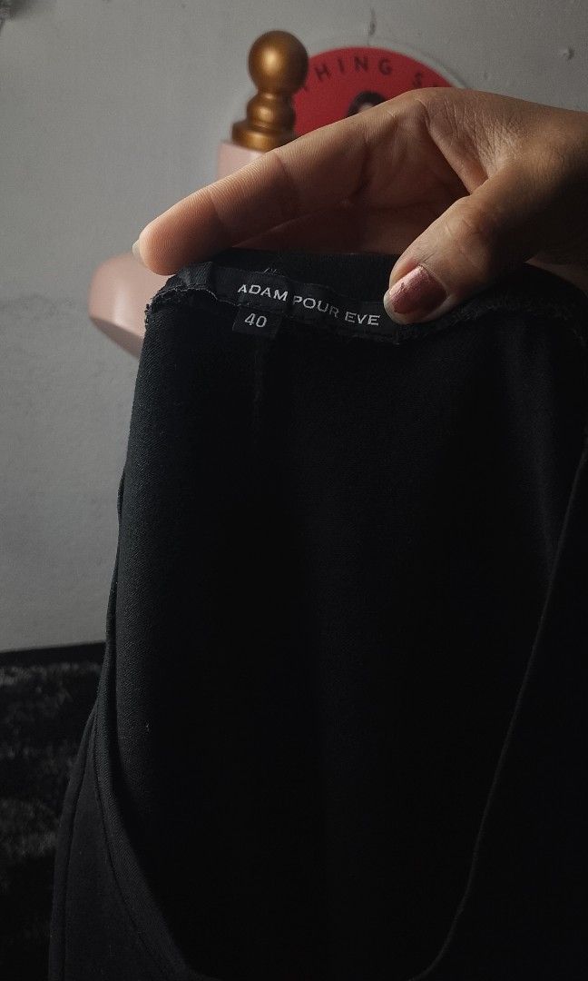 Adam Pour Eve (Category: Blouses) located in Manila. Submitted by jonahq.9 (Listing ID 1468214507, Image 3). Description: 📋 Item Details - Brand: Adam Pour Eve (Adam & Eve) — known for elegant, feminine fashion ​ - Style: Black peplum top with lace hem & Medusa/Greek statue portrait patches on sleeves ​ - Material: 100% cotton — soft, stretchy, breathable ​ - Design: Fitted bodice that flares at the waist, delicate lace trim at the bottom, uniqu