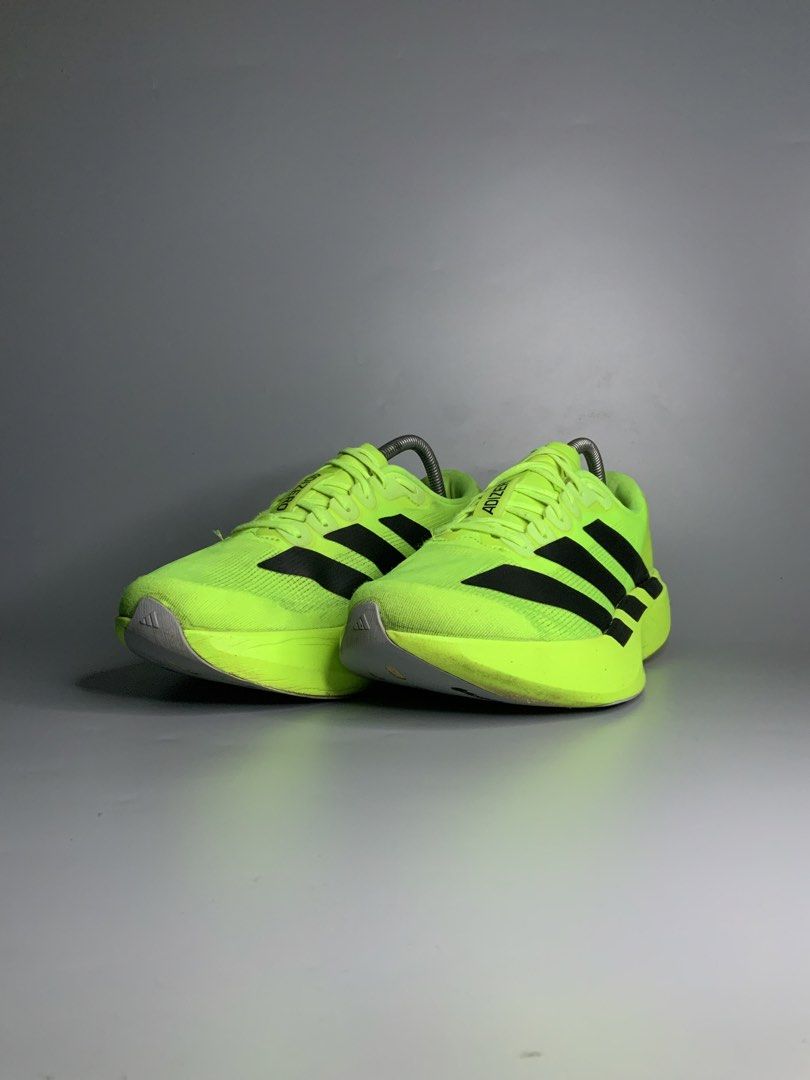 Adidas Adizero Evo SL (Category: Sneakers) located in Cavite. Submitted by kalye_footwear (Listing ID 1468252369, Image 3). Description: - Brand: Adidas Adizero Evo SL - Color: Neon yellowgreen with black stripes - Us 8.5 , Euro 42 , Cm 26.5 - Cushioning: Lightstrike Pro midsole - Upper: Lightweight and breathable mesh - Use: Ideal for daily training and speed work - Sole: Traction rubber outsole.